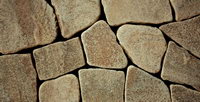 Камень песчаник окатанный желто-коричневый