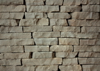 Фасадно-стеновой колотый камень песчаник серо-коричневый